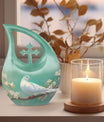 10-inch Dove Bird Urn for ashes with Cross Drop design