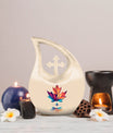 10-inch pink Mapple Leaf urn with Cross Drop design,