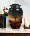 Large cross urn for adult female human ashes, suitable as burial and cremation container.