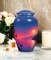 Medium-sized blue cremation urn with sun design, suitable for both men and women to memorialize human ashes