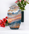 Vibrant Swirl urn for ashes with personalization option.