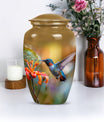 Humming bird design urn.