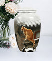 10-inch orange cat memorial urn in classic design.