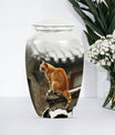 10-inch orange cat memorial urn in classic design.