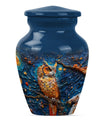 classic aluminium owl urn with howling wolf theme.