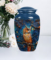 classic aluminium owl urn with howling wolf theme.