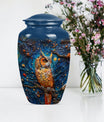 classic aluminium owl urn with howling wolf theme.