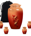 Gold fish urn with butterfly theme, ideal for memorial ashes