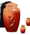 Gold fish urn with butterfly theme, ideal for memorial ashes