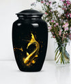 large gold fish cremation urn.