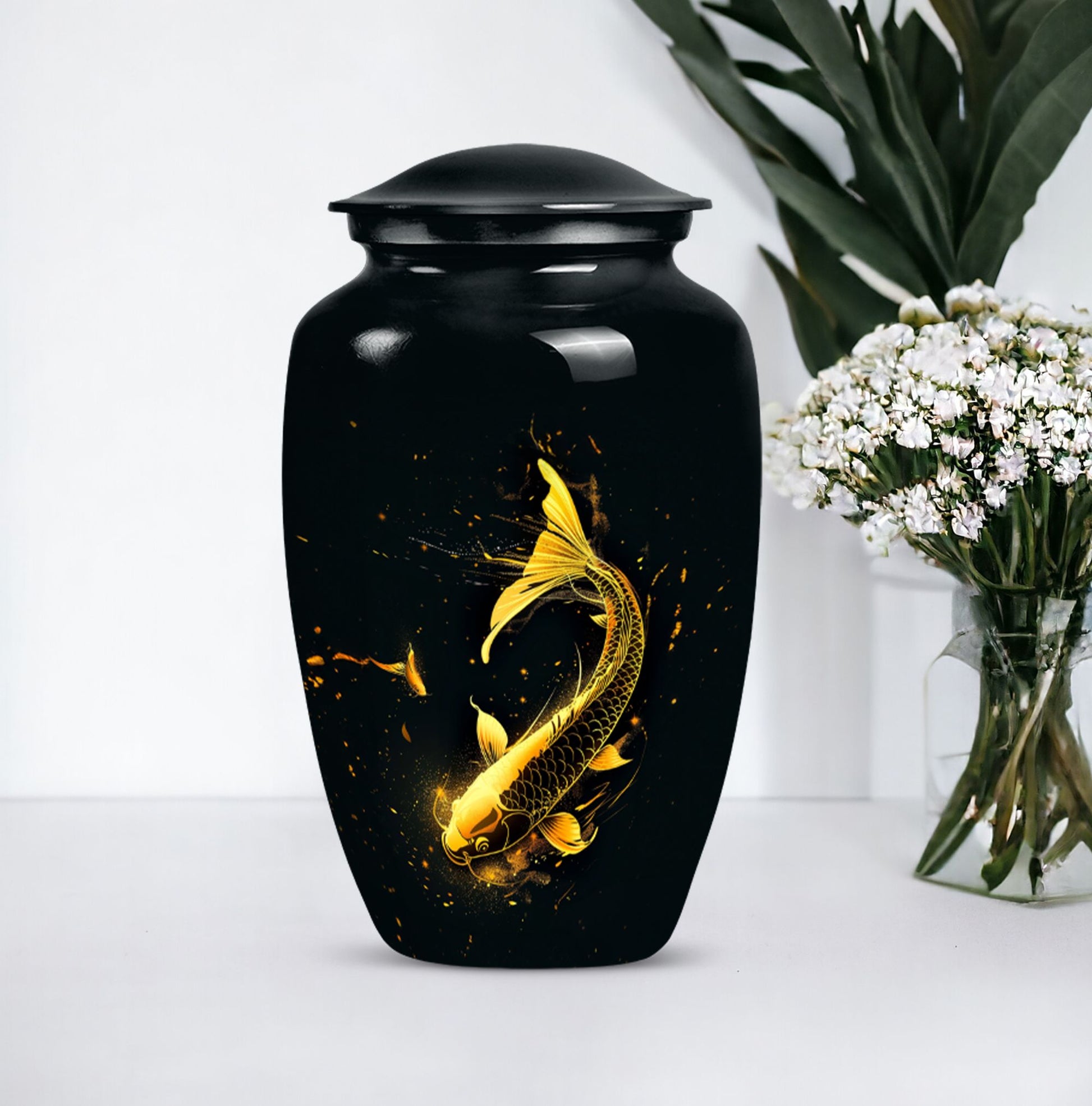 large gold fish cremation urn.