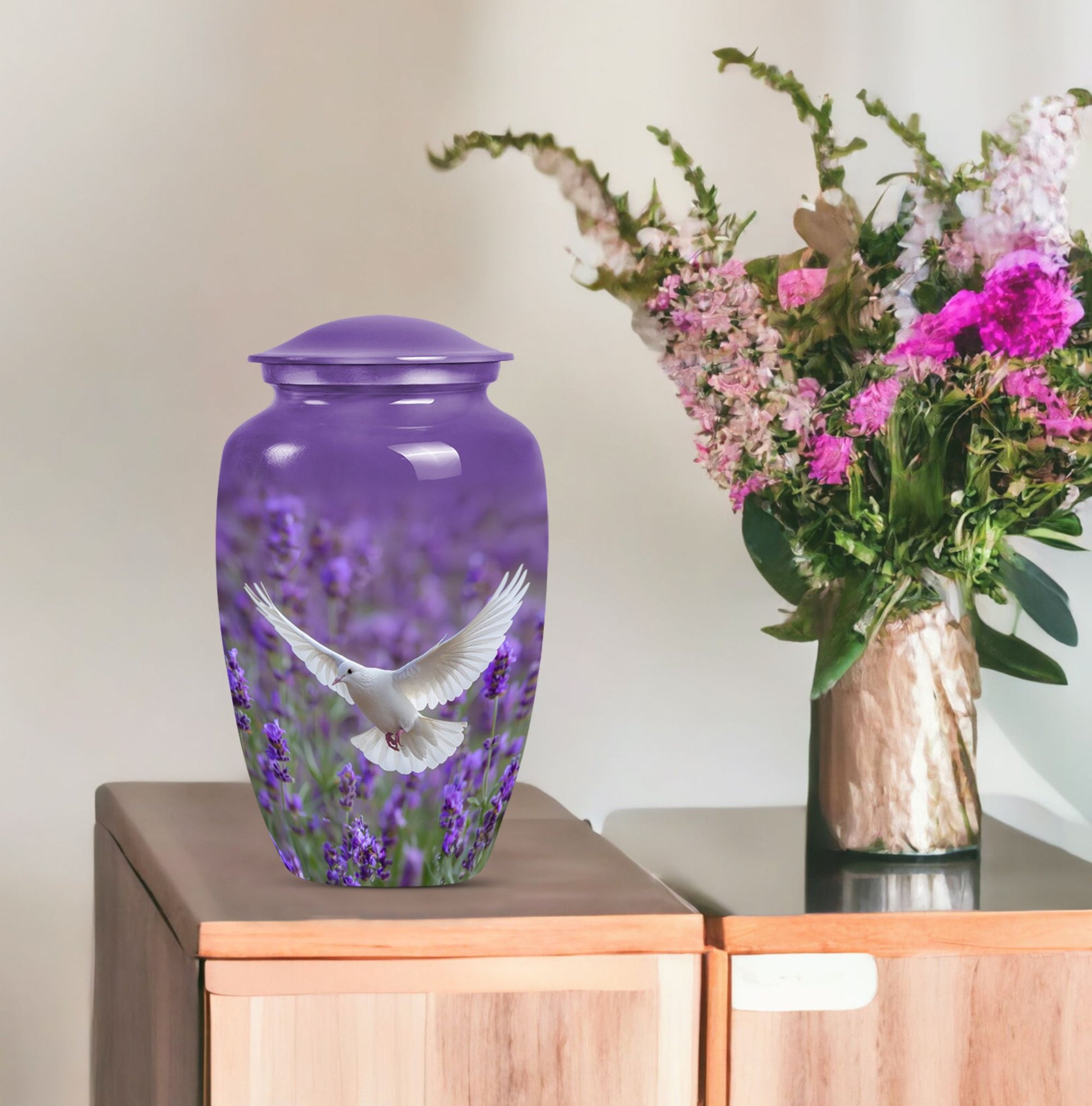 White dove on a classic purple urn.