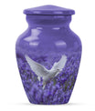 white dove on purple urn with butterfly theme.