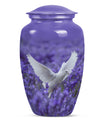 white dove on purple urn with butterfly theme.