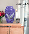 white dove on purple urn with butterfly theme.