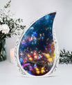 Large urn adorned with colorful butterflies in a magical forest, ideal for adult female ashes burial or cremation