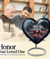 Large, heart-shaped Wolf Howling themed urn for burial ashes, customizable by engraving