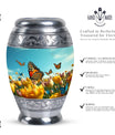 Large Butterflies Urn for adult human ashes, crafted from aluminium, personalizable with engraved names, a product of Monar_Urn