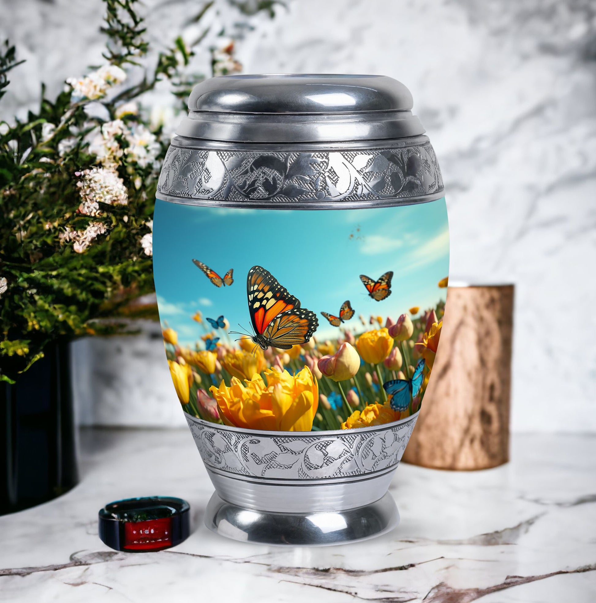 Large Butterflies Urn for adult human ashes, crafted from aluminium, personalizable with engraved names, a product of Monar_Urn