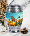 Large Butterflies Urn for adult human ashes, crafted from aluminium, personalizable with engraved names, a product of Monar_Urn