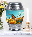 Large Butterflies Urn for adult human ashes, crafted from aluminium, personalizable with engraved names, a product of Monar_Urn