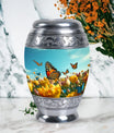 Large Butterflies Urn for adult human ashes, crafted from aluminium, personalizable with engraved names, a product of Monar_Urn