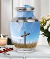 Classic 3-inch Jesus Christ Cross cremation urn.