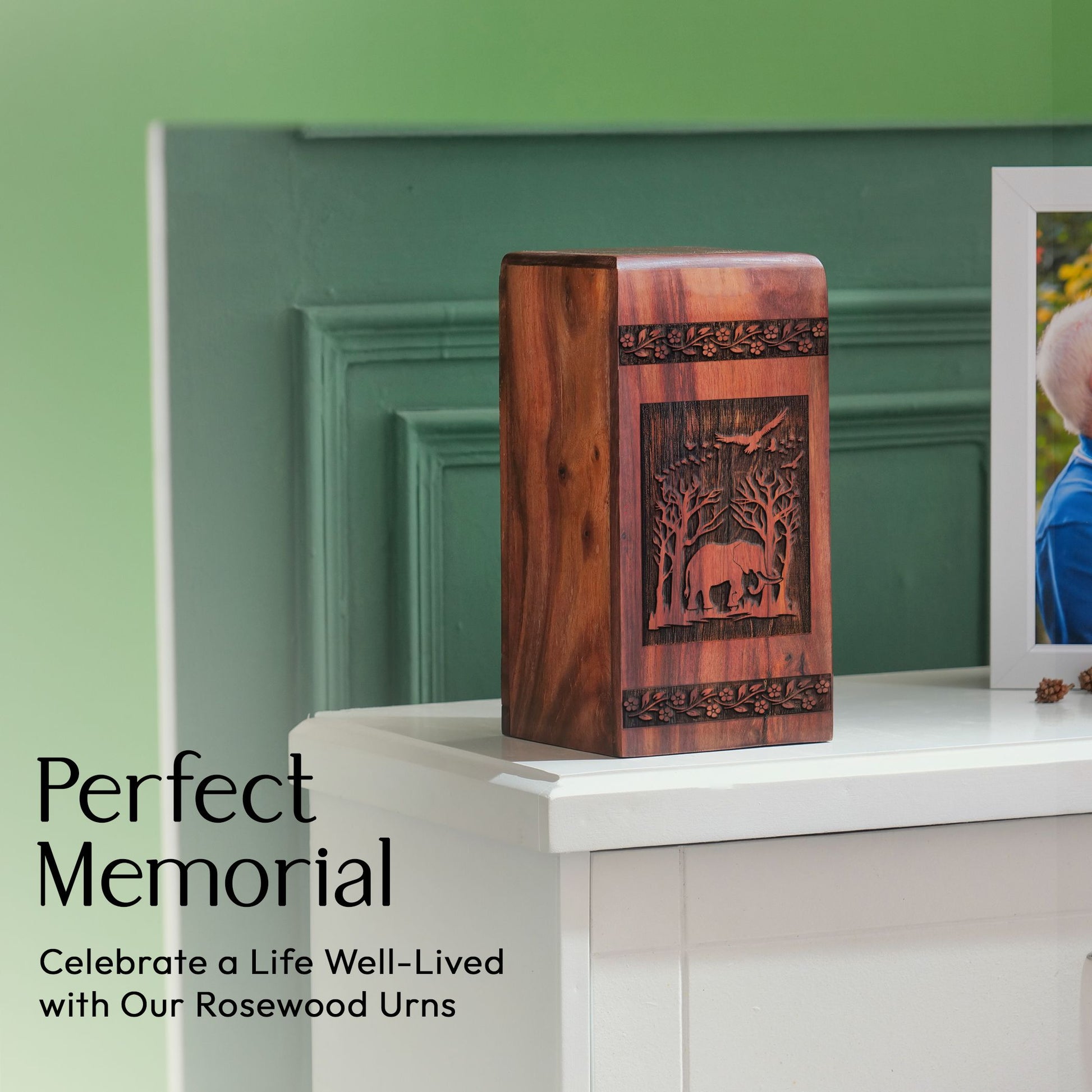 Large wooden urn featuring an elephant design, suitable for storing adult male human ashes.