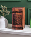 Elegant wooden cremation urn featuring elephant design, ideal for adult female ashes, decorative for burial