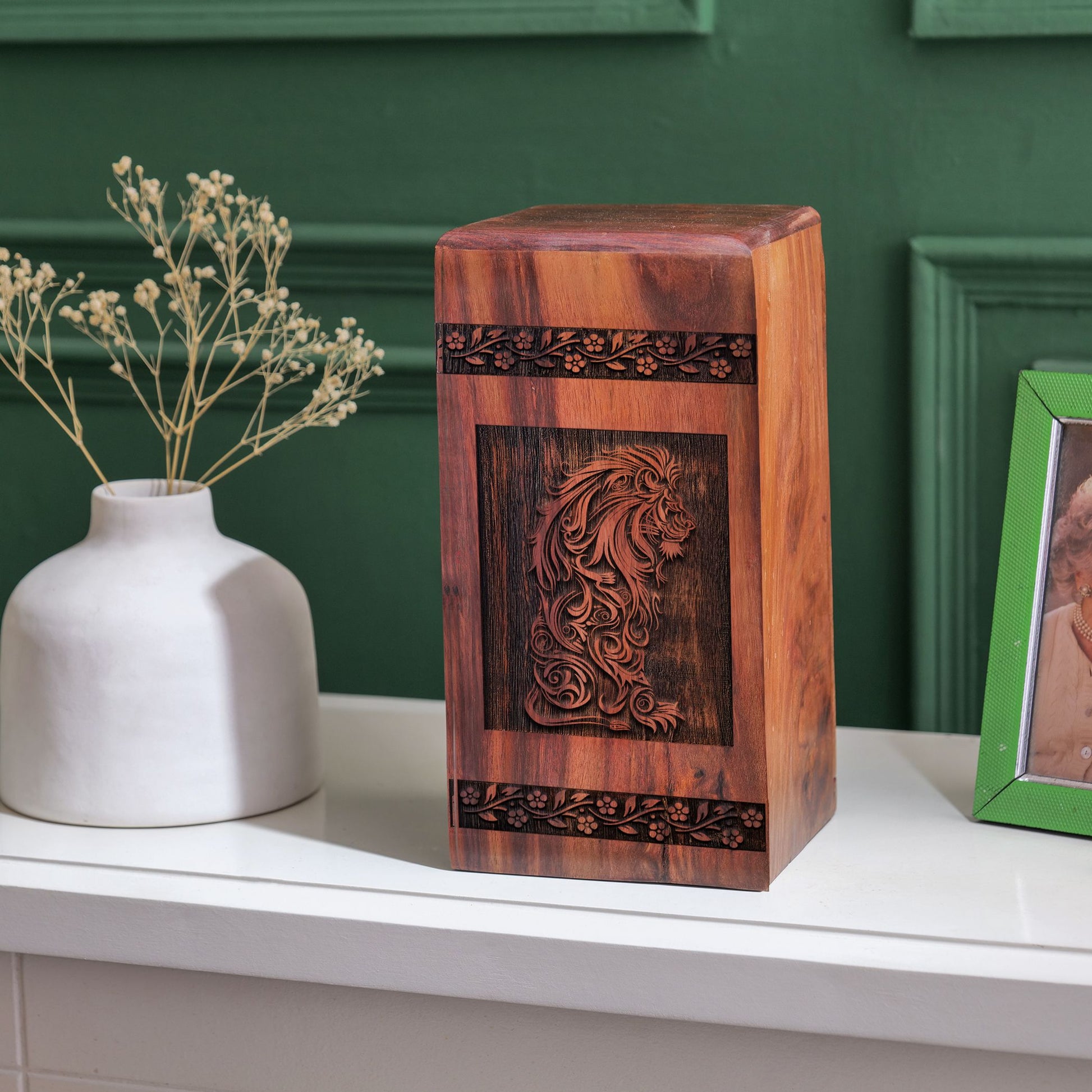 Lion styled wooden urn designed for adult male human ashes, a symbolic resting place.